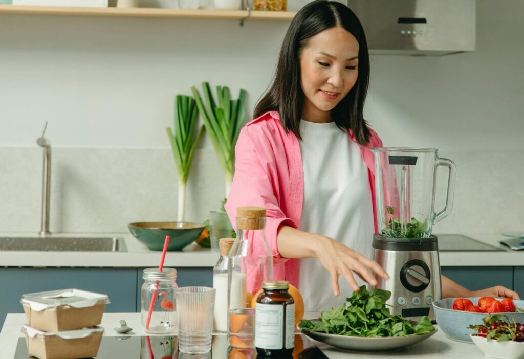 woman is using food processor